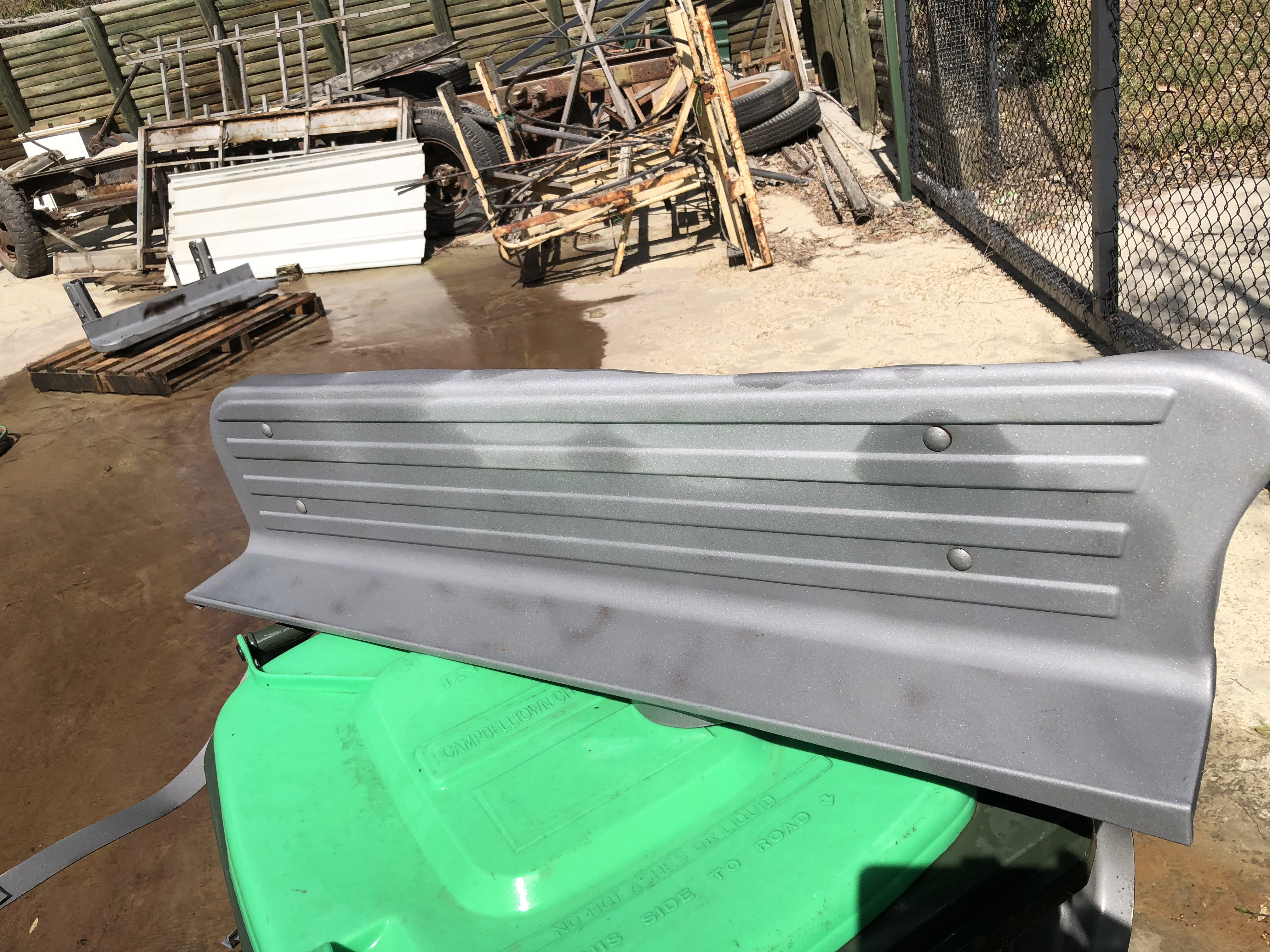 Running board stripped to bare metal